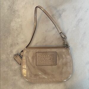 Coach Shimmering Beige Wristlet